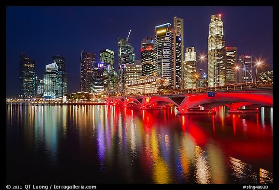 Bridge and Singapore skyline at night. Singapore