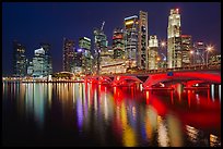 Bridge and Singapore skyline at night. Singapore