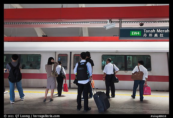 Passengers preparing to board MRT train. Singapore