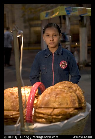 Young street food vendor by night. Guadalajara, Jalisco, Mexico