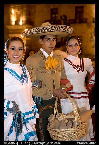 Man with sombrero hat surrounded by  two women. Guadalajara, Jalisco, Mexico