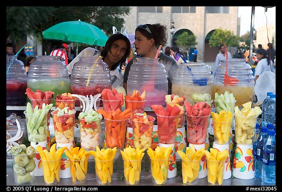 Cups of fresh fruits offered for sale on the street. Guadalajara, Jalisco, Mexico (color)