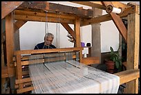 Weaver operating a traditional machine, Tlaquepaque. Jalisco, Mexico