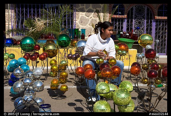 Woman polishing glass spheres, Tonala. Jalisco, Mexico