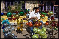 Woman polishing glass spheres, Tonala. Jalisco, Mexico ( color)