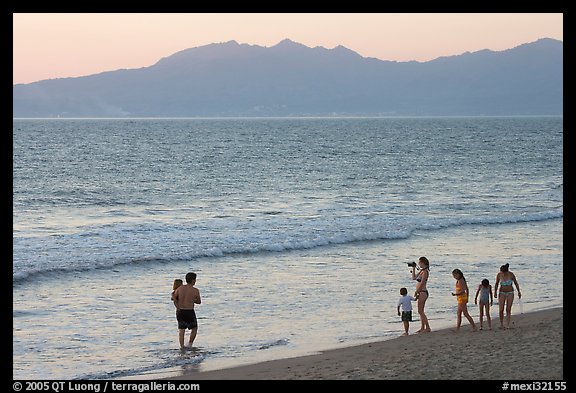 Family on the beach at sunset, Nuevo Vallarta, Nayarit. Jalisco, Mexico