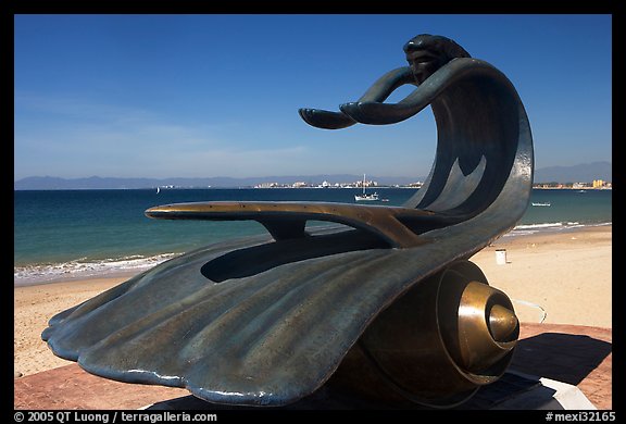 Sculpture by Bustamante on the seaside walkway with beach in the background, Puerto Vallarta, Jalisco. Jalisco, Mexico (color)