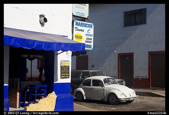 Restaurant at a street corner and Mexico made Wolskwagen bug, Puerto Vallarta, Jalisco. Jalisco, Mexico (color)