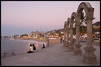 Arches on the Malecon at dusk, Puerto Vallarta, Jalisco. Jalisco, Mexico (color)