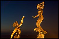 Mermaid statue by night, Puerto Vallarta, Jalisco. Jalisco, Mexico
