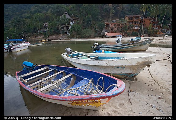 Small boats beached in a lagoon in fishing village, Boca de Tomatlan, Jalisco. Jalisco, Mexico (color)