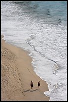 Couple walking on the beach seen from above, Puerto Vallarta, Jalisco. Jalisco, Mexico ( color)