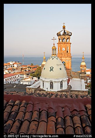 Red tile roof, Templo de Guadalupe Cathedral, and ocean early morning, Puerto Vallarta, Jalisco. Jalisco, Mexico (color)