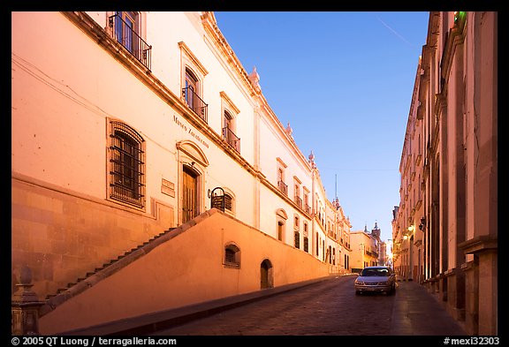Car in street at dawn with Zacatecas Museum. Zacatecas, Mexico