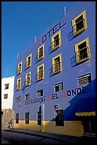 Hotel restaurant building painted bright blue and yellow. Guanajuato, Mexico ( color)