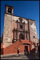 People walking in front of church San Roque, early morning. Guanajuato, Mexico ( color)