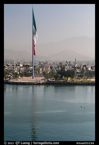 Largest Mexican flag sagging in early morning, Ensenada. Baja California, Mexico