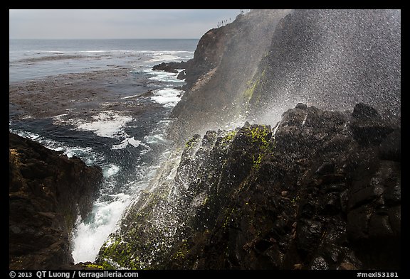 Cliffs and spray from blowhole, La Bufadora. Baja California, Mexico
