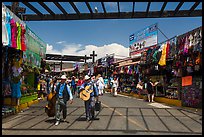 Musicians walking in flee market, La Bufadora. Baja California, Mexico ( color)