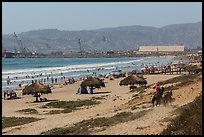 Beach with shade palapas and horseman, Ensenada. Baja California, Mexico ( color)