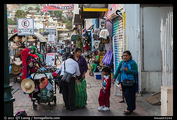 Women packing souvenirs for sale, Ensenada. Baja California, Mexico