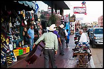 Musicians walking on street, Ensenada. Baja California, Mexico ( color)