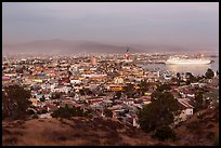 Panoramic view of city from hills at sunset, Ensenada. Baja California, Mexico (color)