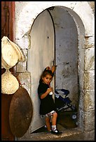 Girl in a doorway. Jerusalem, Israel
