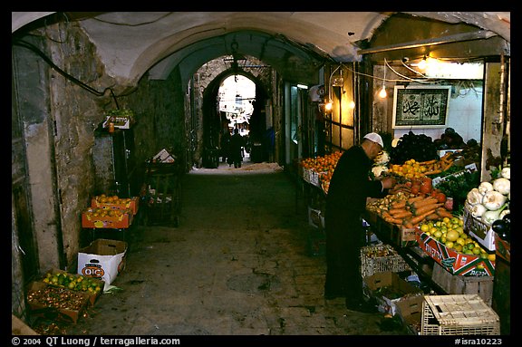 Fruit and vegetable store in an old town archway. Jerusalem, Israel (color)