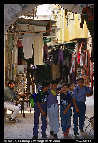 Children in a busy old town alley. Jerusalem, Israel