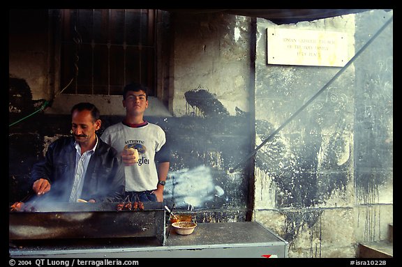 Food vendor broiling meat. Jerusalem, Israel (color)