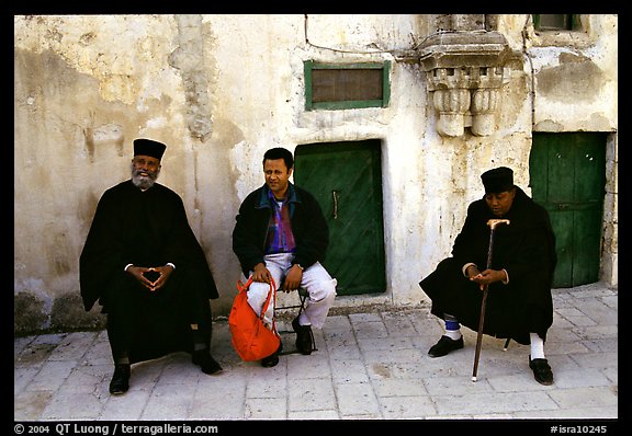 Copt monks and pilgrim in the Ethiopian Monastery. Jerusalem, Israel (color)