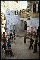 Group of children in old street, Hebron. West Bank, Occupied Territories (Israel) (color)