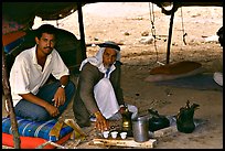 Bedouin men offering tea in a tent, Judean Desert. West Bank, Occupied Territories (Israel) ( color)