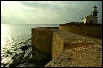 Seawall and lighthouse, late afternoon, Akko (Acre). Israel (color)