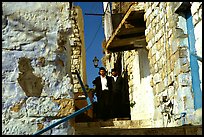 Orthodox jews in a narrow alley, Safed (Tsfat). Israel (color)