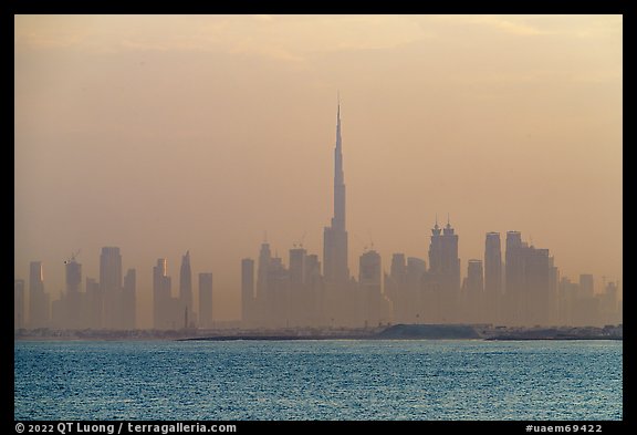 Dubai skyline with Burj Khalifa above Persian Gulf, sunrise. United Arab Emirates (color)
