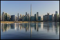 Downtown skyline reflected in Dubai Creek. United Arab Emirates ( color)