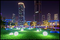 Park along Marina Promenade at night. United Arab Emirates ( color)