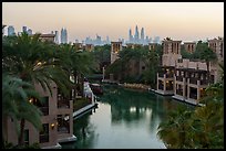 Medina Jumerah lush gardens and city skyline. United Arab Emirates ( color)