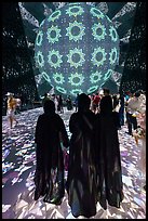 Women in abaya at light show, Saudi Arabia Pavilion. Expo 2020, Dubai, United Arab Emirates ( color)