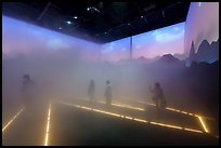 Visitors walk in Swizerland Pavilion fog. Expo 2020, Dubai, United Arab Emirates ( color)