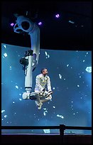 Man performing with robotic arm, Kazakhstan Pavilion. Expo 2020, Dubai, United Arab Emirates ( color)