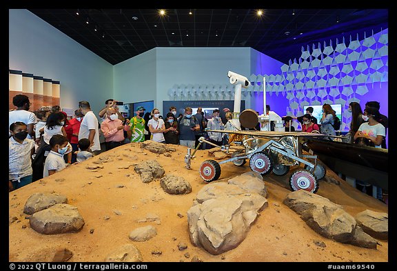 Visitors looking at Mars rover exhibit, USA Pavilion. Expo 2020, Dubai, United Arab Emirates (color)