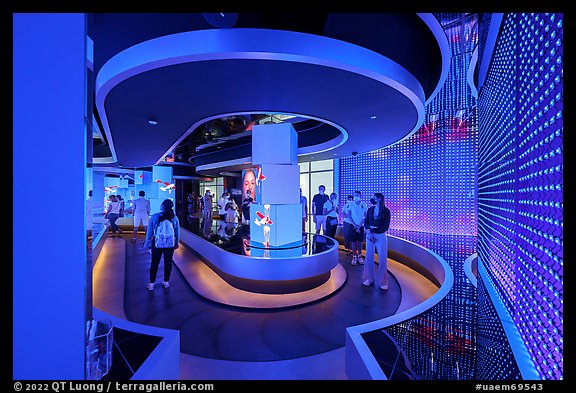 Visitors on moving walkway, Exhibit 3, USA Pavilion. Expo 2020, Dubai, United Arab Emirates (color)