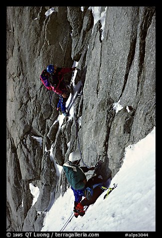 Climbers Frank and Alain start the Super-Couloir on Mt Blanc du Tacul, Mont-Blanc Range, Alps, France.  (color)