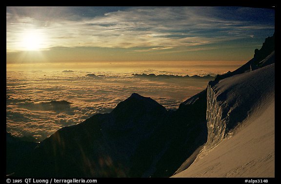 Sun setting over Bionnassay ridge, just under the summit of Mont-Blanc, Italy.