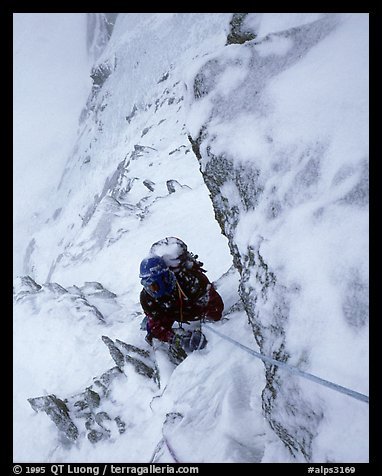 Frank Levy during a storm,  North face of Les Droites,  Mont-Blanc Range, Alps, France.