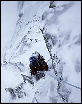 Frank Levy during a storm,  North face of Les Droites,  Mont-Blanc Range, Alps, France. (color)