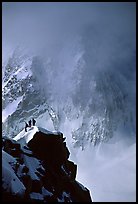 Alpinists on a buttress of Aiguille du Midi climbing the Cosmiques ridge. Alps, France ( color)
